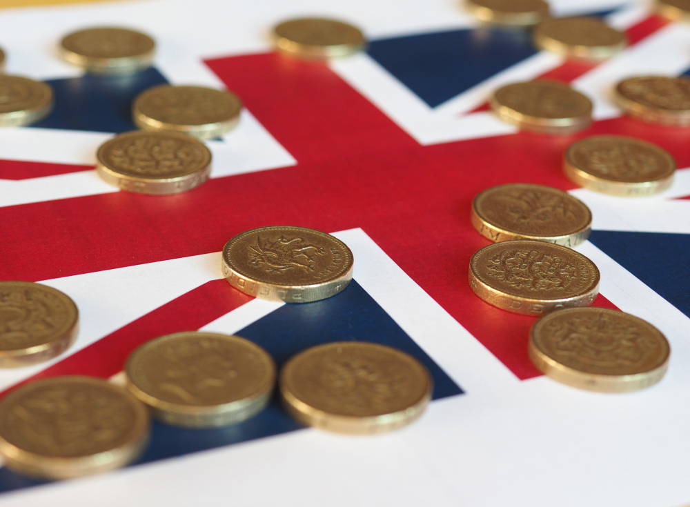 Coins on a Union Jack flag
