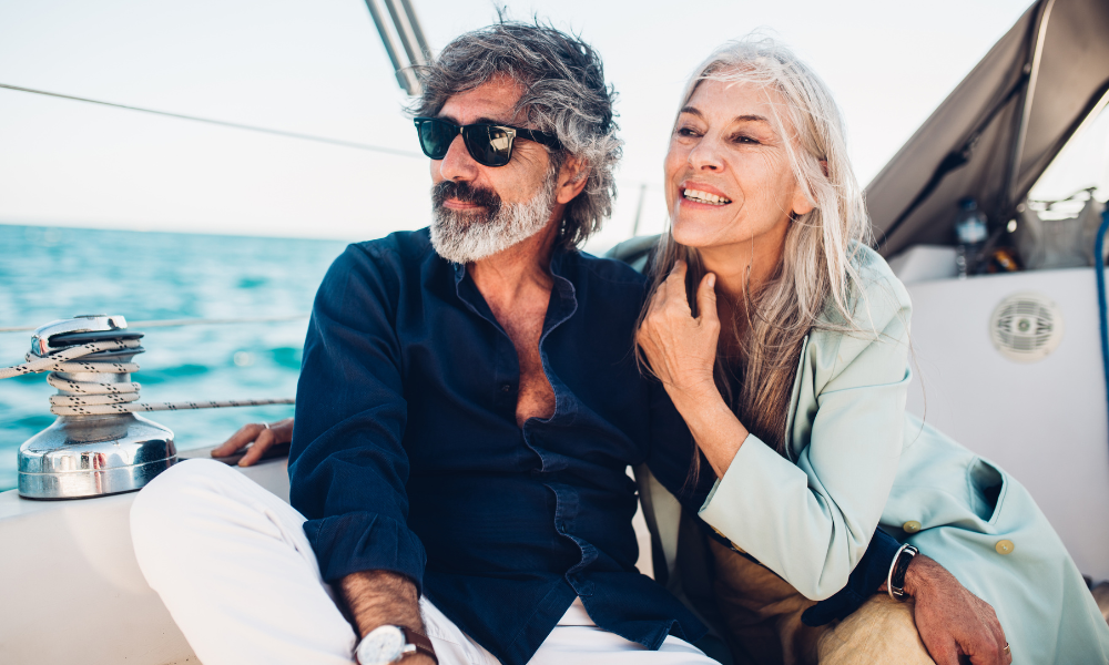 Retired couple holidaying on a yacht